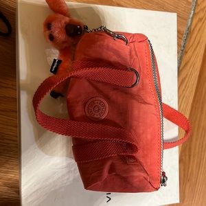 Kipling mini coral bag
